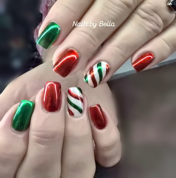 Red and green chrome nails with candy-cane stripes