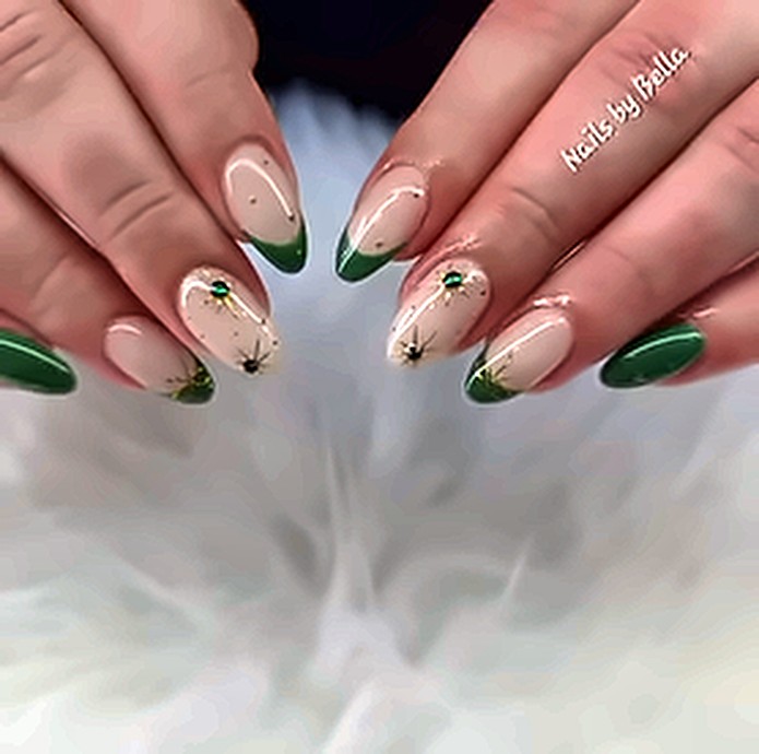 Nude nails with green French tips and gold festive details